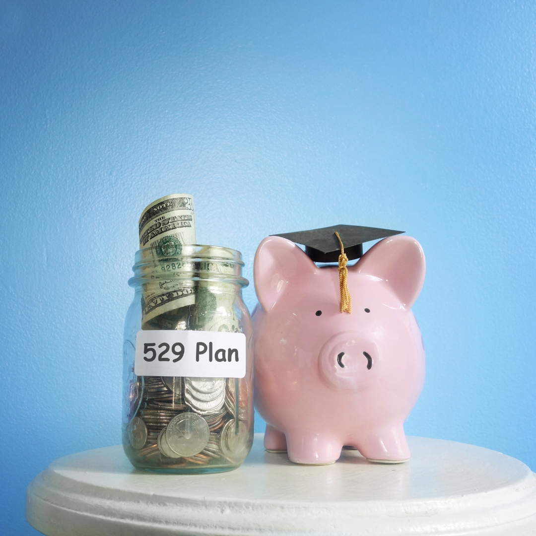 529 Education Savings Plan in a mason jar and piggy bank