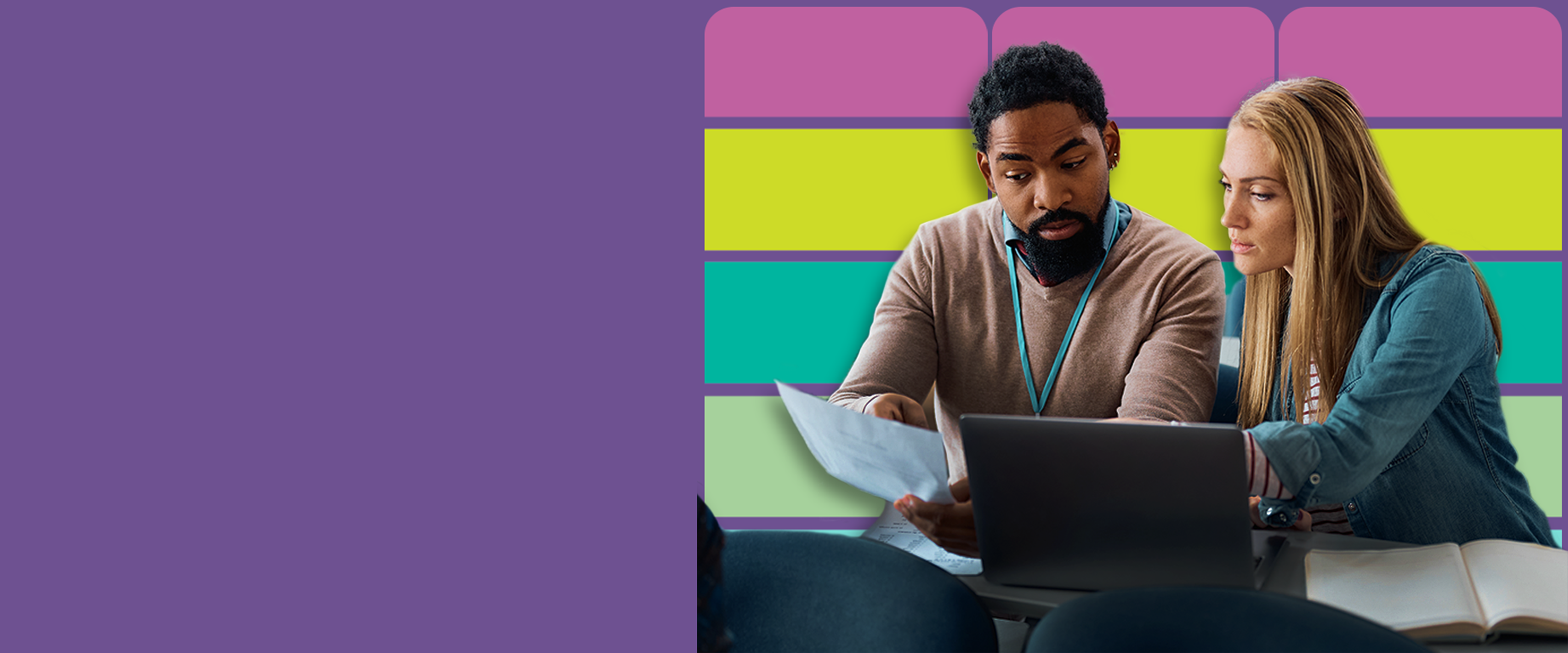 Older man and woman looking at laptop