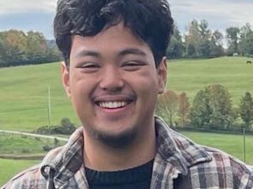 student standing in field