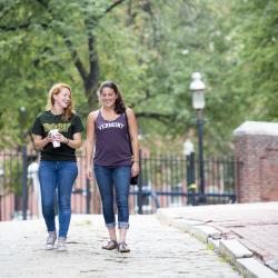 Two Vermont students walking on campus
