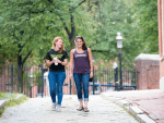 Two Vermont students walking on campus